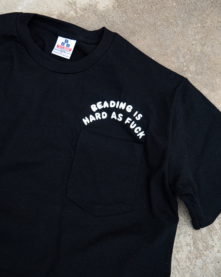 Reading is... Pocket T-Shirt (Black)